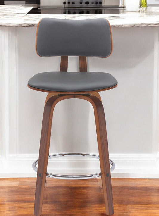26" Gray And Wood Brown Faux Leather Swivel Low Back Counter Height Bar Chair-0