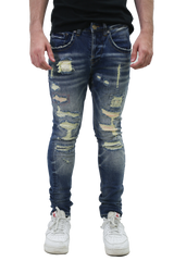 RIPPED MID-RISE SKINNY JEANS