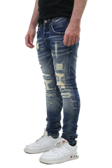RIPPED MID-RISE SKINNY JEANS