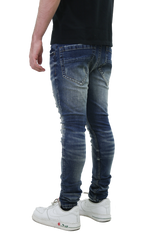 RIPPED MID-RISE SKINNY JEANS