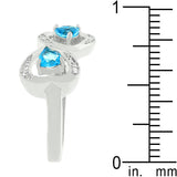 Mirrored Hearts Ring featuring clear cubic zirconia and blue gemstones, showcasing elegant heart design.