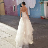 Exquisite A-line Backless Side-Split Bridal Gown Featuring Floral Appliques & Plunging V Neck