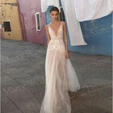 Exquisite A-line Backless Side-Split Bridal Gown Featuring Floral Appliques & Plunging V Neck